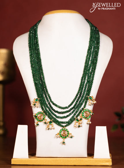 Beaded multilayer green necklace lakshmi pendant with green jadau stones and pearl & beads hanging without earrings