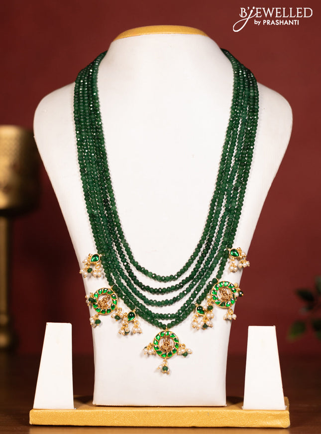 Beaded multilayer green necklace lakshmi pendant with green jadau stones and pearl & beads hanging without earrings