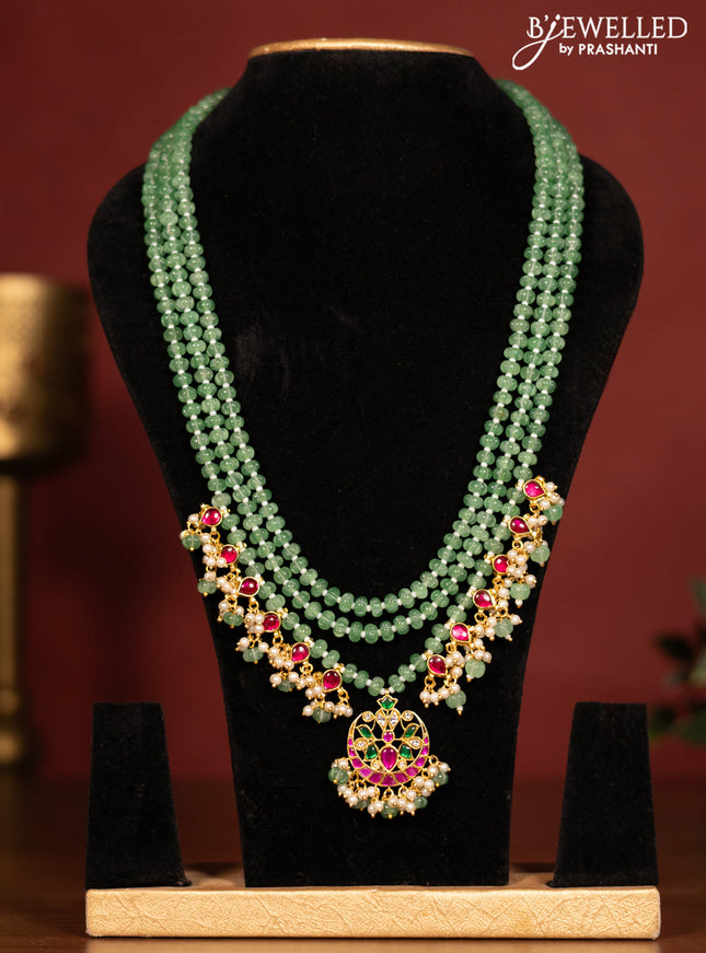 Beaded triple layer mint green necklace chandbali pendant with jadau kundan stones and pearl & beads hanging without earrings