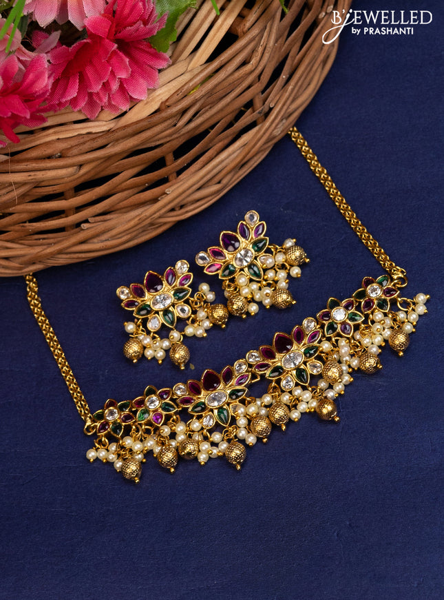 Antique choker lotus design with kemp & cz stones and pearl & golden beads hanging