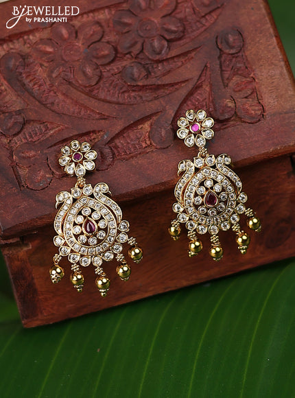 Antique earrings with pink kemp & cz stons and golden beads hanging