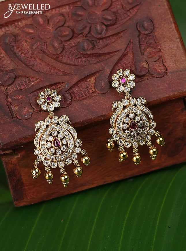 Antique earrings with pink kemp & cz stons and golden beads hanging