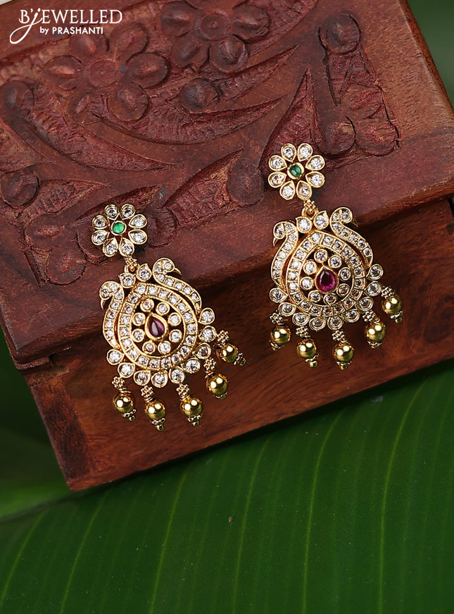 Antique earrings with kemp & cz stons and golden beads hanging