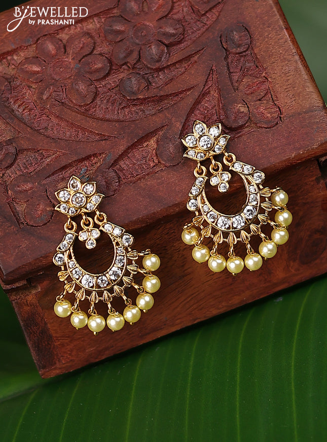 Antique earrings chandbali design with cz stones and pearl hangings