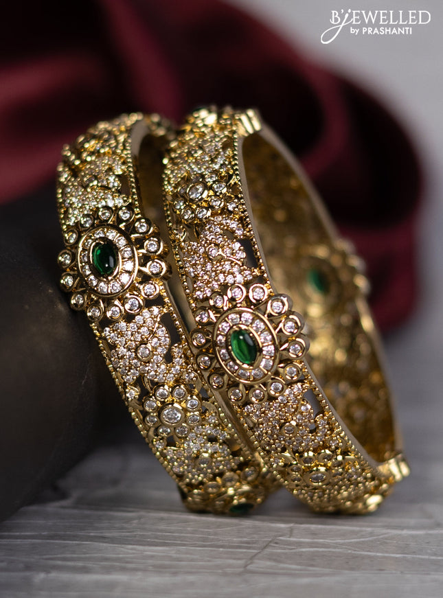 Antique bangle with green kemp and cz stones