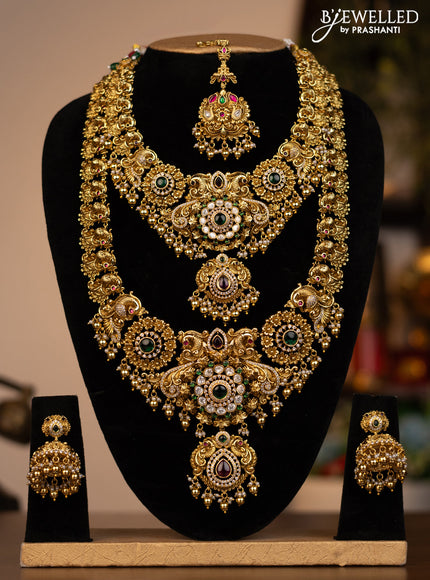 Antique combo set peacock design with jadau kundan stones and pearl & golden beads hanging