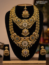 Antique combo set peacock design with jadau kundan stones and pearl & golden beads hanging