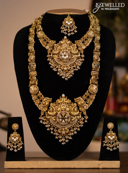 Antique combo set peacock design with jadau kundan stones and pearl & golden beads hanging