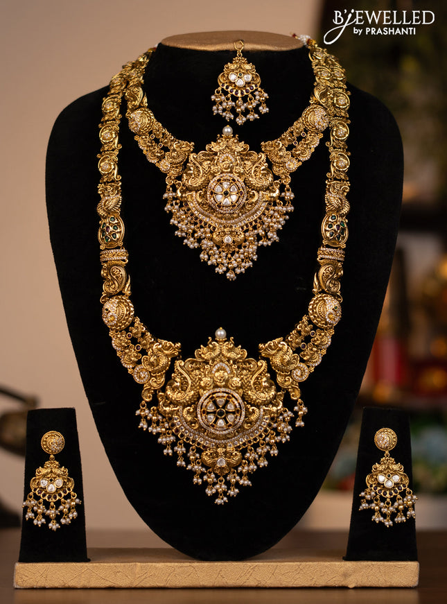 Antique combo set peacock design with jadau kundan stones and pearl & golden beads hanging