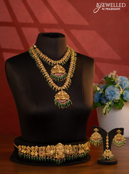 Antique bridal set lakshmi design with jadau cz stones and pearl & green beads hanging