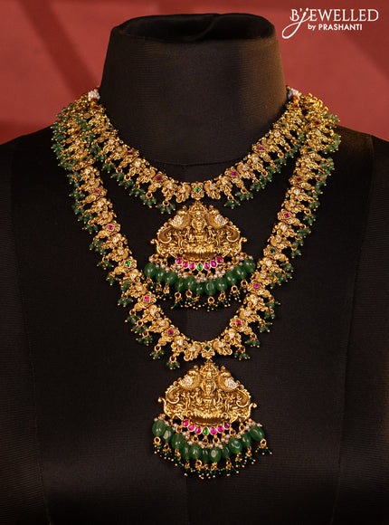Antique bridal set lakshmi design with jadau cz stones and pearl & green beads hanging