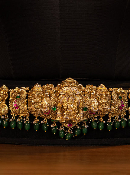 Antique bridal set lakshmi design with jadau cz stones and pearl & green beads hanging