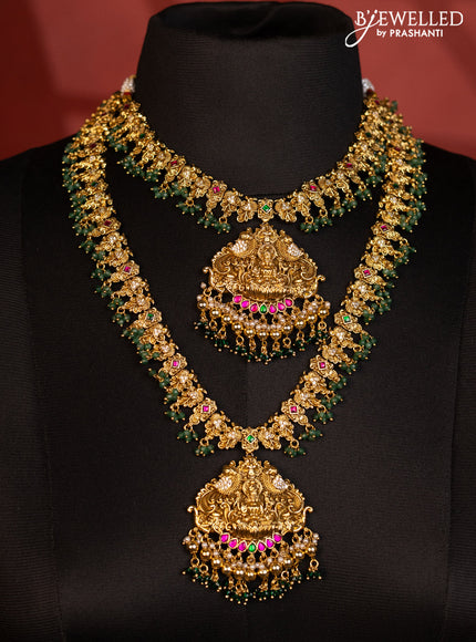 Antique bridal set lakshmi design with jadau cz stones and green beads hanging