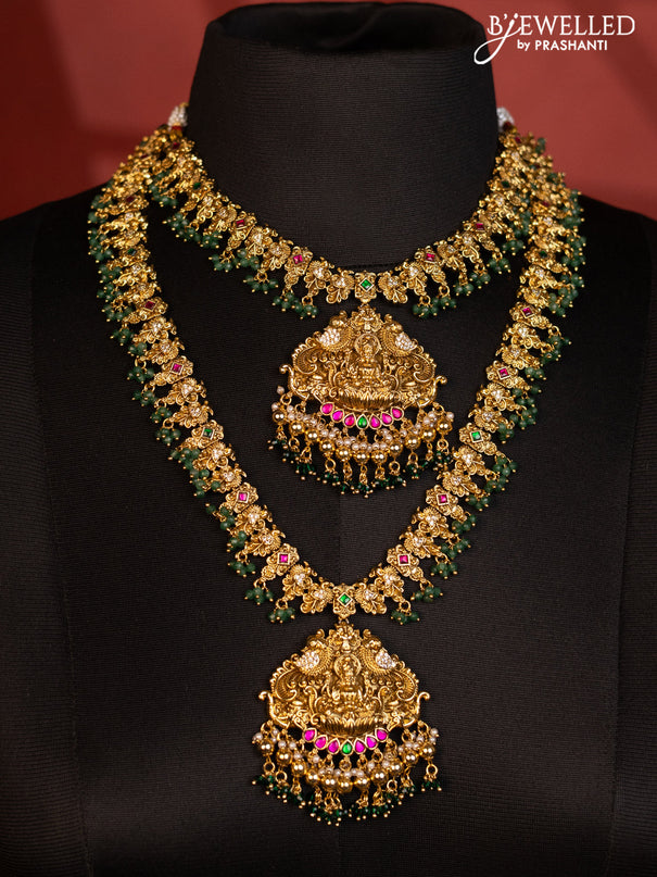 Antique bridal set lakshmi design with jadau cz stones and green beads hanging