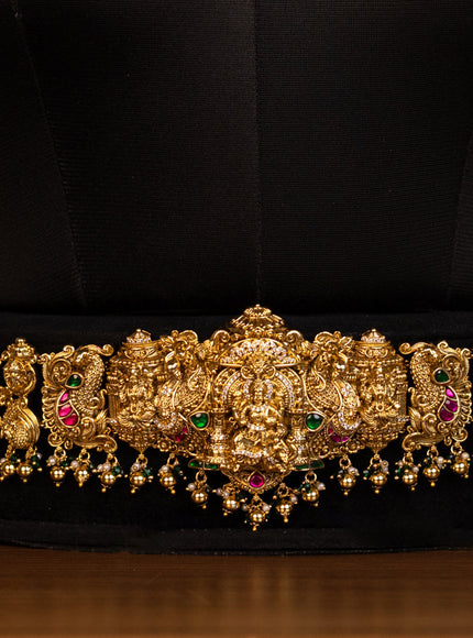 Antique bridal set lakshmi design with jadau cz stones and green beads hanging