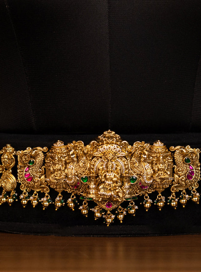 Antique bridal set lakshmi design with jadau cz stones and green beads hanging