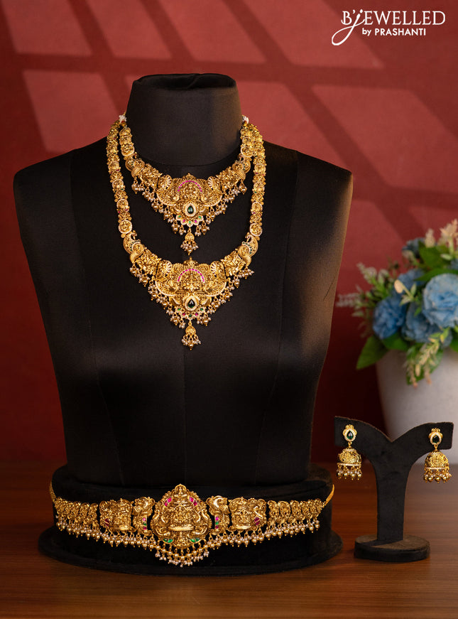 Antique bridal set lakshmi design with jadau cz stones and pearl & golden beads hanging