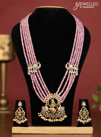 Beaded multilayer baby pink necklace krishna pendant with cz stones and pearl & beads hanging in victorian finish