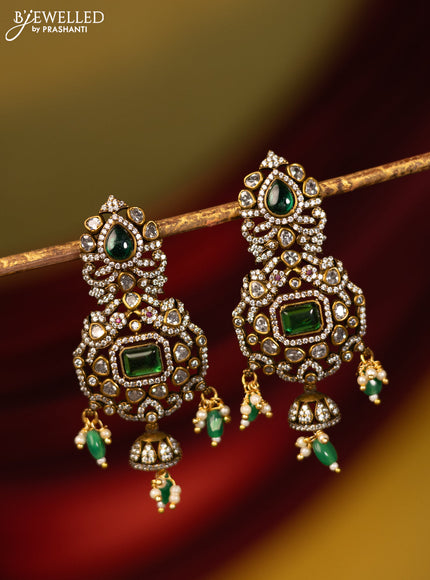 Earrings with emerald & cz stones and beads hanging in victorian finish