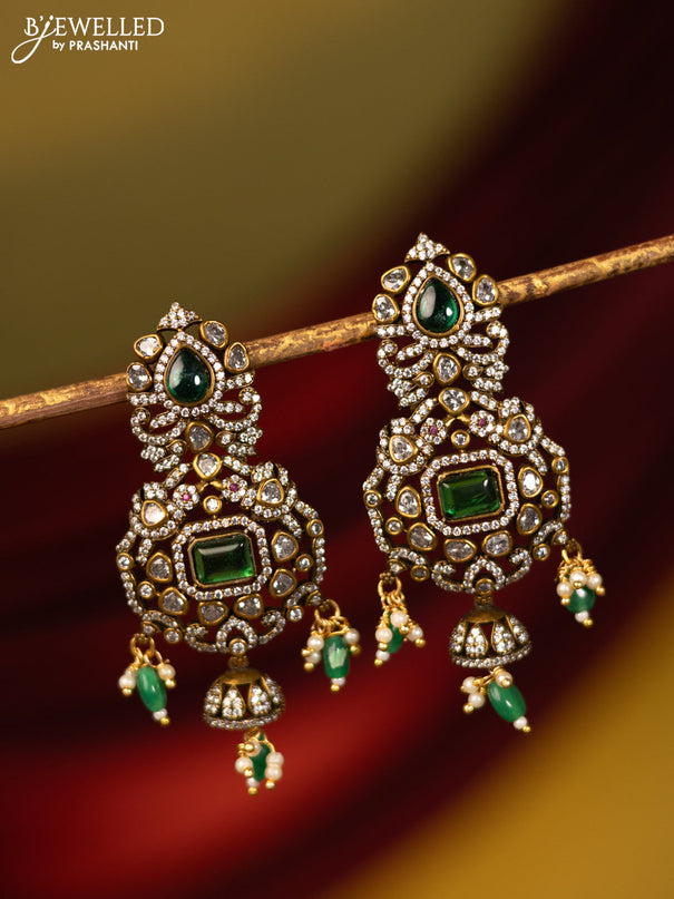 Earrings with emerald & cz stones and beads hanging in victorian finish
