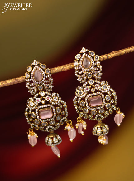 Earrings with baby pink & cz stones and beads hanging in victorian finish