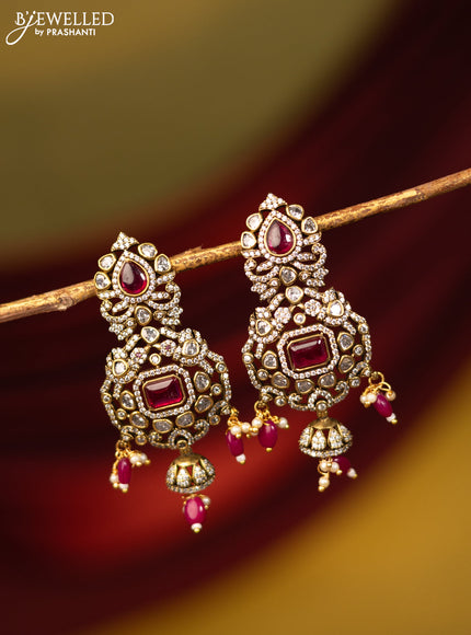 Earrings with ruby & cz stones and beads hanging in victorian finish