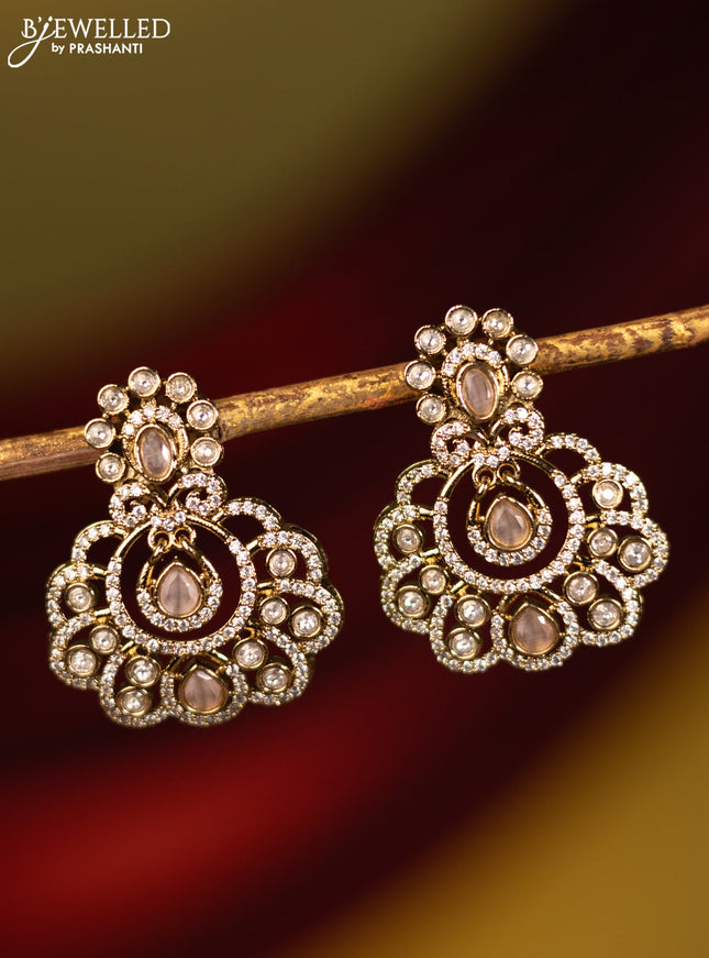 Earrings with baby pink and cz stones in victorian finish