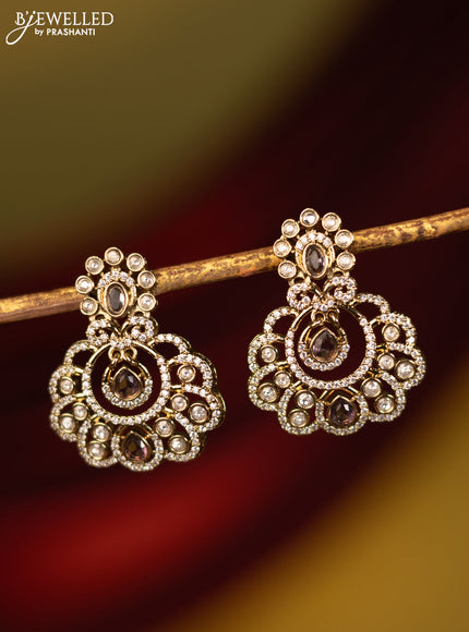 Earrings with violet and cz stones in victorian finish