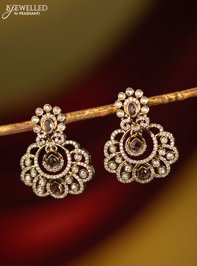 Earrings with violet and cz stones in victorian finish