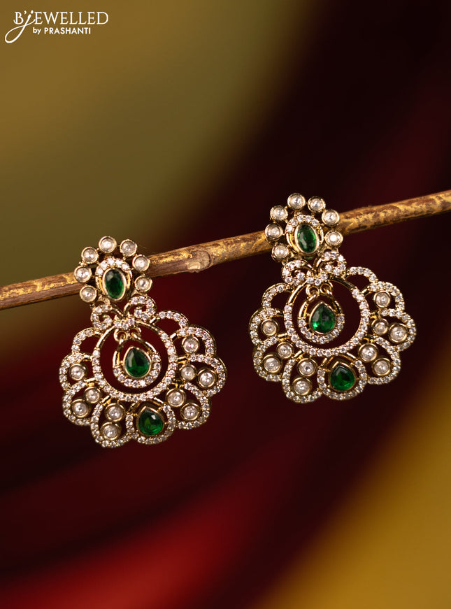 Earrings with emerald and cz stones in victorian finish