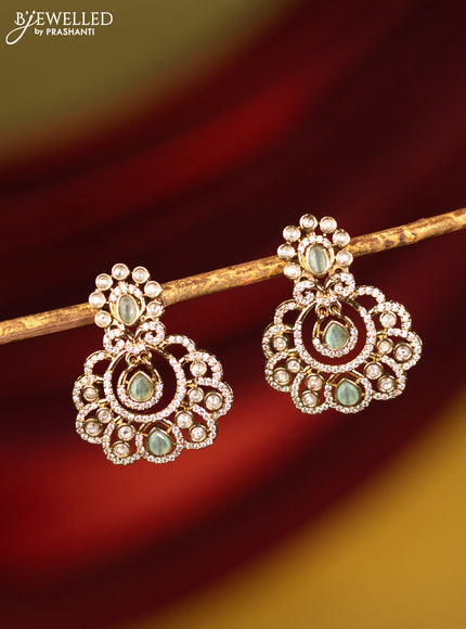 Earrings with mint green and cz stones in victorian finish