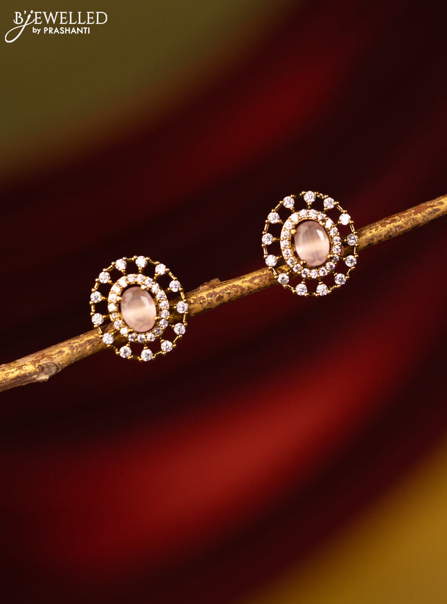 Earrings with baby pink and cz stones in victorian finish