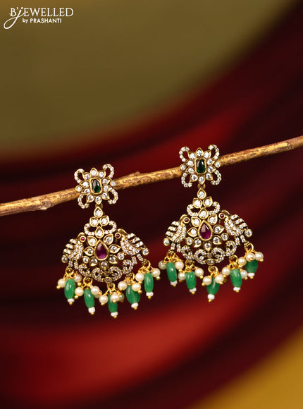 Earrings with kemp & cz stones and beads hanging in victorian finish