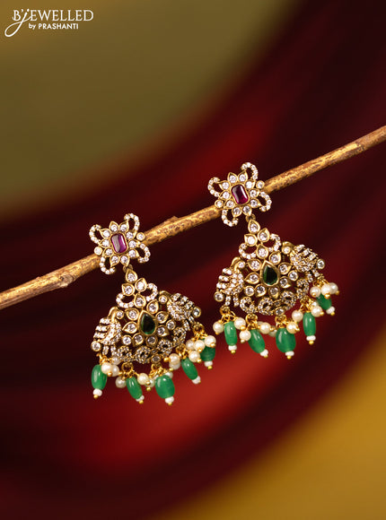 Earrings with kemp & cz stones and beads hanging in victorian finish