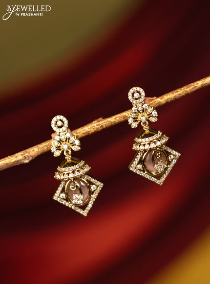 Earrings with baby pink and cz stones in victorian finish