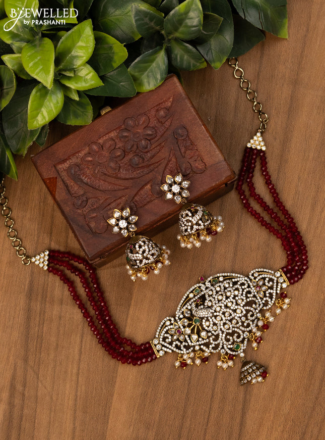Beaded maroon choker with kemp & cz stones and pearl hangings in victorian finish