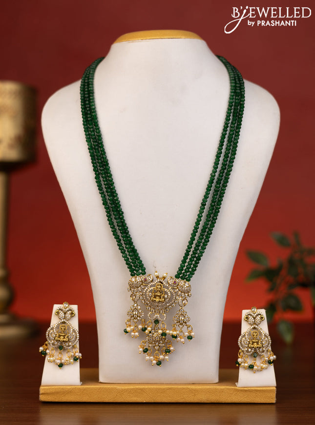 Beaded triple layer green necklace lakshmi pendant with emerald & cz stones and beads hanging in victorian finish