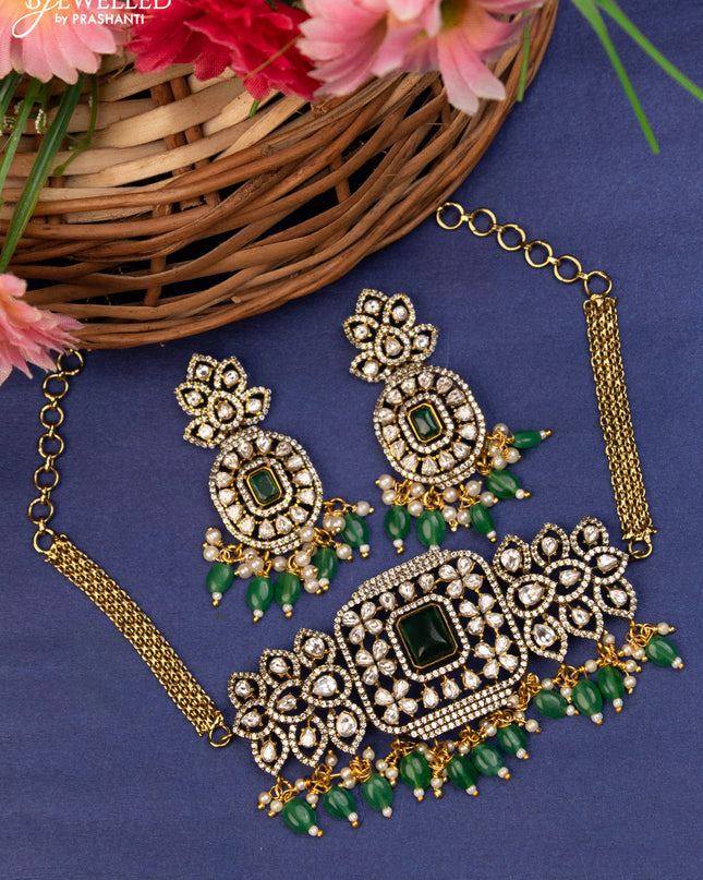 Choker with emerald & kundan stones and beads hanging in victorian finish