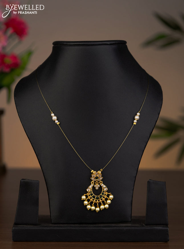 Invisible chain chandbali pendant with emerald & cz stones and pearl hangings without earrings
