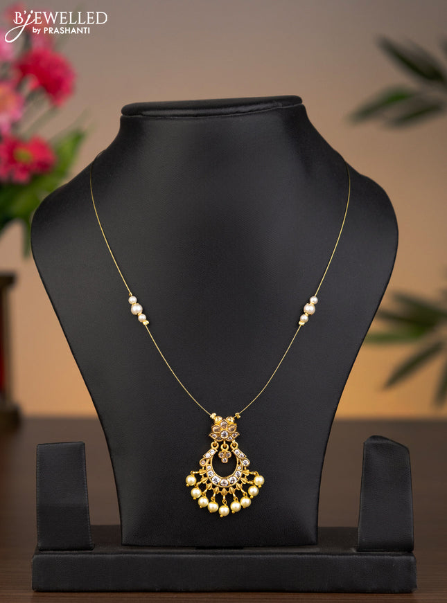 Invisible chain chandbali pendant with cz stones and pearl hangings without earrings
