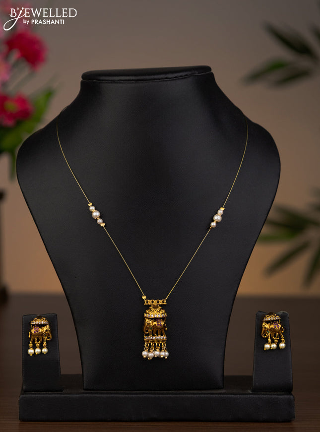 Invisible chain elephant pendant with kemp & cz stones and pearl hangings