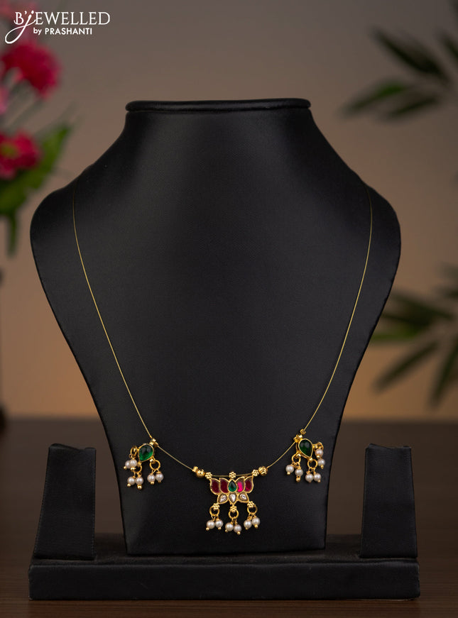 Invisible chain minakari lotus pendant with kundan stones and pearl hangings withour earrings