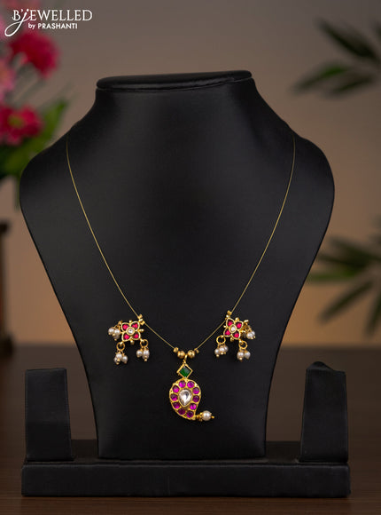 Invisible chain manga pendant with jadau kundan stones and pearl hangings without earrings