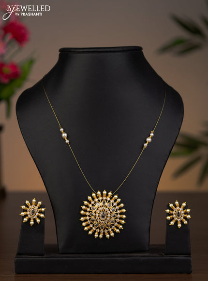 Invisible chain with cz stones pendant and pearls