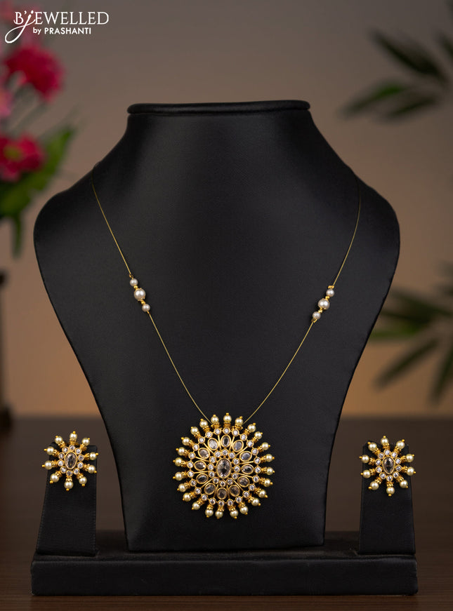 Invisible chain with cz stones pendant and pearls