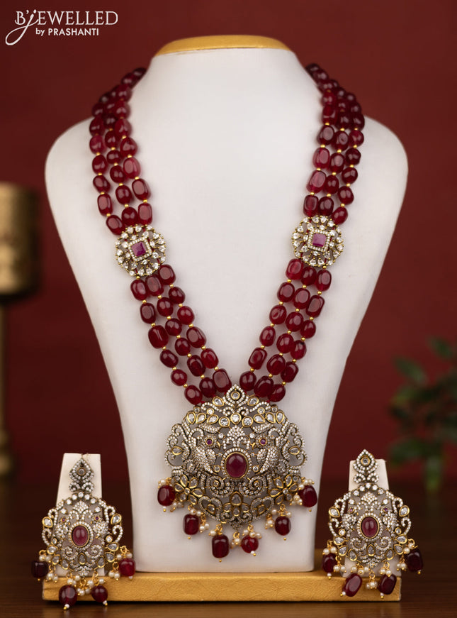 Beaded triple layer maroon necklace with ruby & cz stones and beads hanging in victorian finish