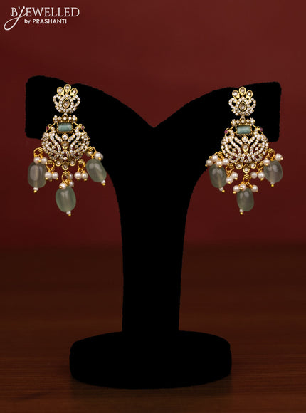 Beaded double layer mint green necklace peacock pendant with ruby & cz stones and beads hanging in victorian finish