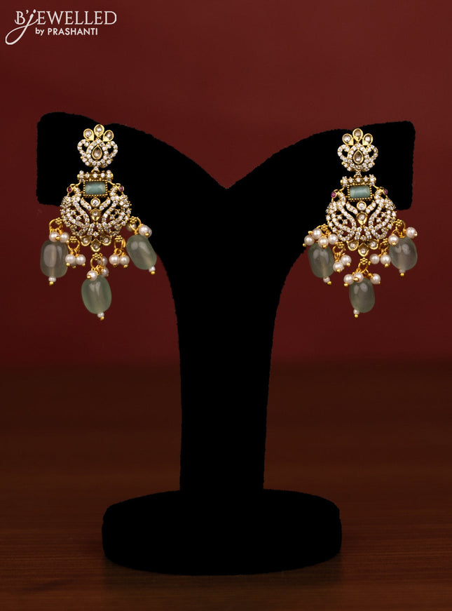 Beaded double layer mint green necklace peacock pendant with ruby & cz stones and beads hanging in victorian finish