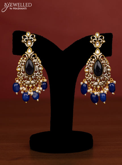 Beaded triple layer blue necklace peacock pendant with ruby & cz stones and beads hanging in victorian finish