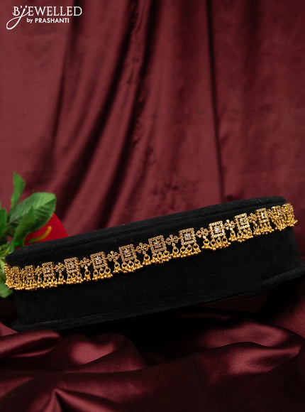 Antique hip chain with cz stones and golden beads hanging